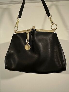 Black Leather Shoulder Bag with Gold Accents